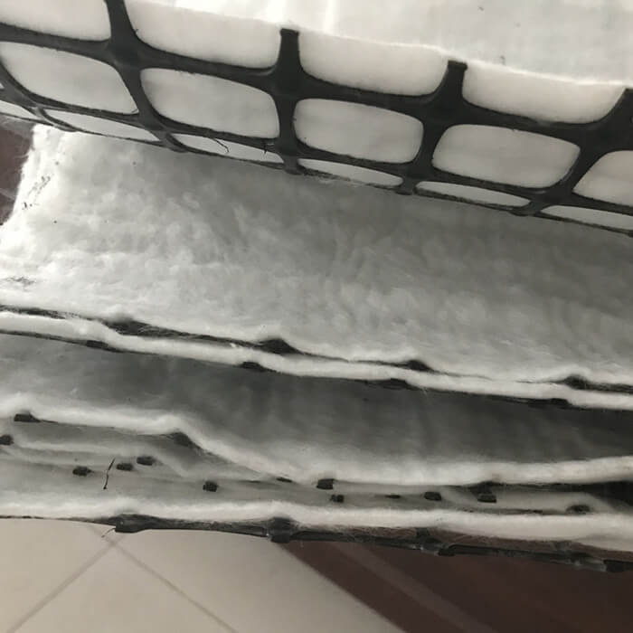 Geomalla compuesta con geotextil