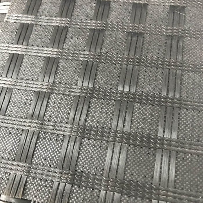 Geomalla de fibra de vidrio con geotextil