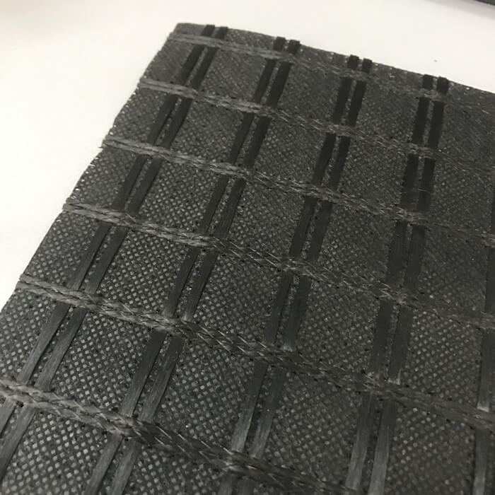Geomalla de fibra de vidrio con geotextil no tejido