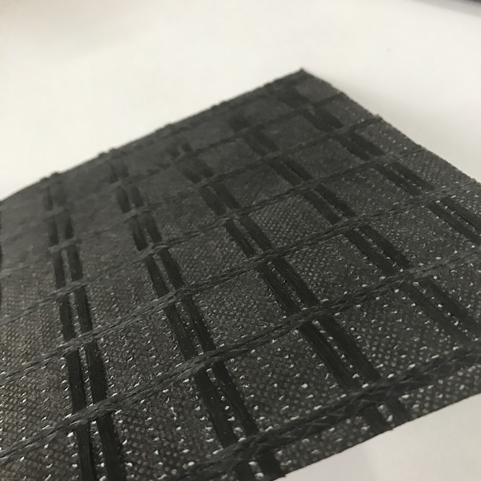 Geomalla de fibra de vidrio cosida con geotextil
